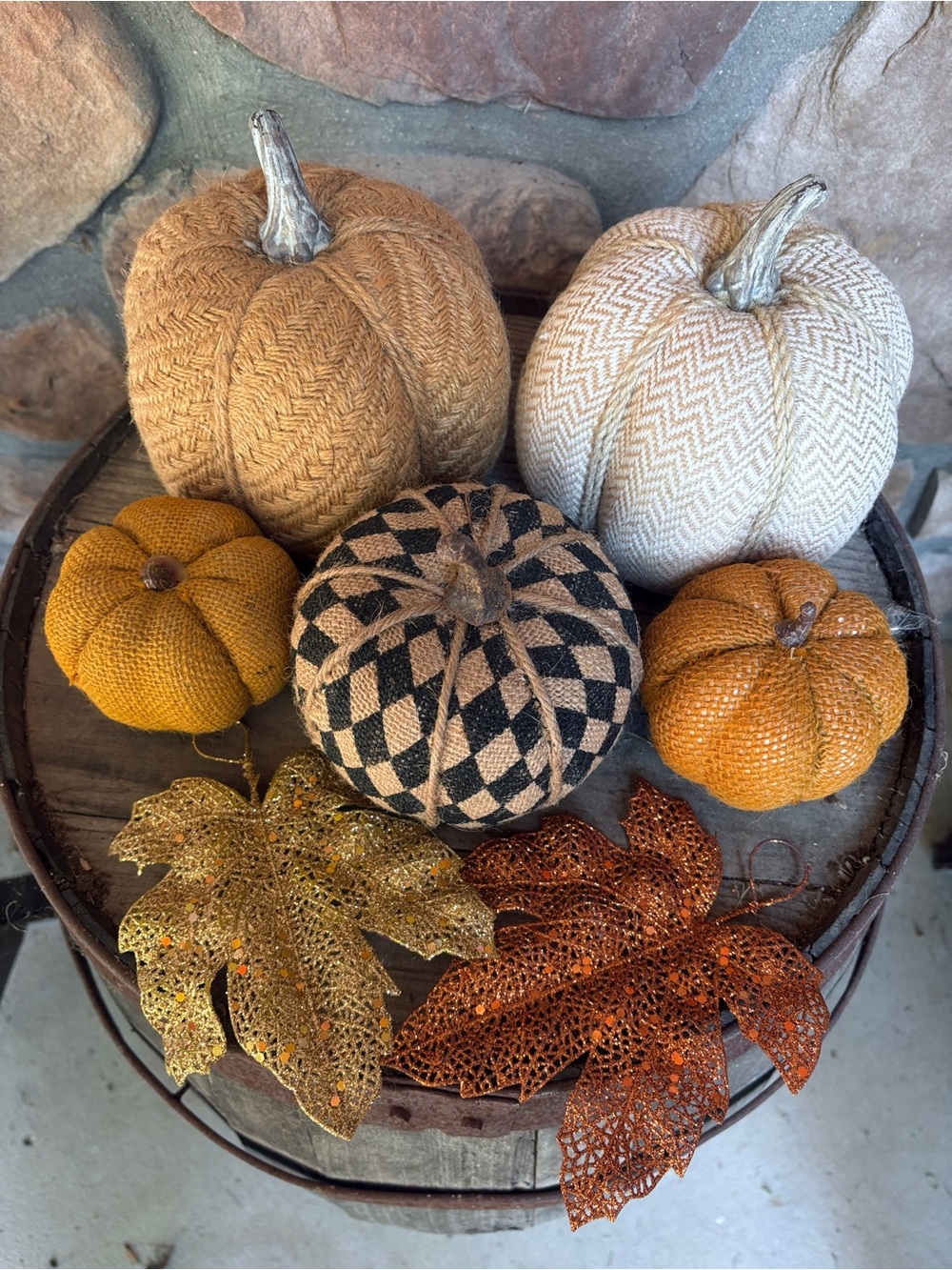 Burlap pumpkin assortment with two sparkly autumn leaves